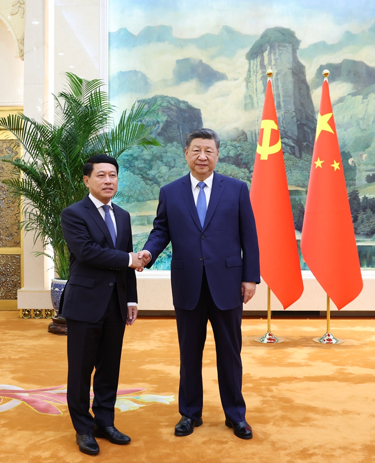 习近平会见老挝人民革命党中央总书记、国家主席特使...